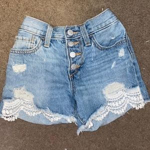 jean shorts with white lace
